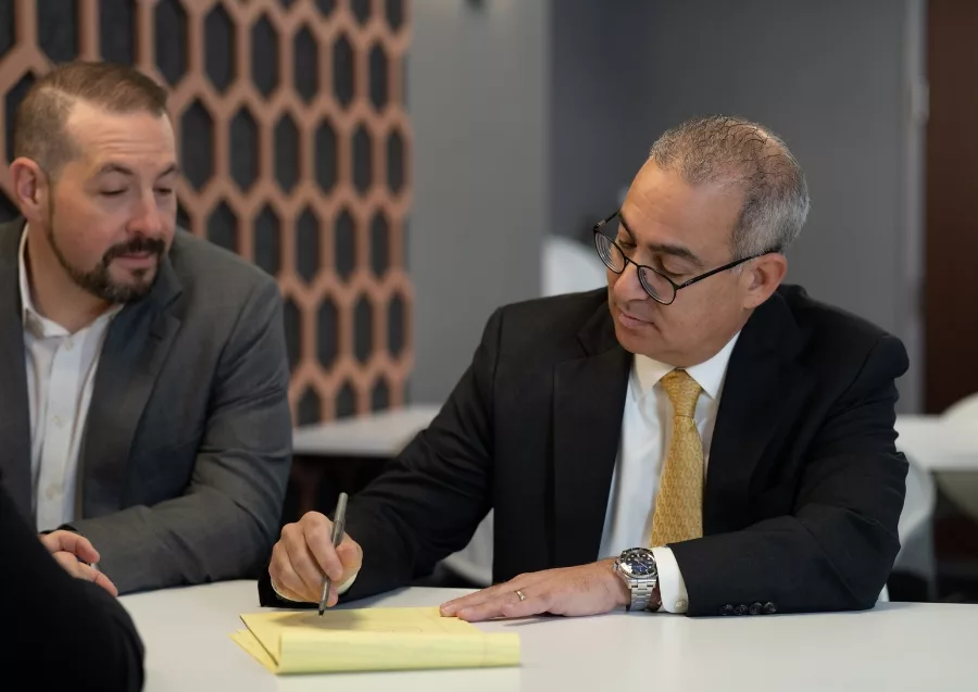 Todd Geller, founder of Geller Private Wealth, discussing a personal financial plan with clients